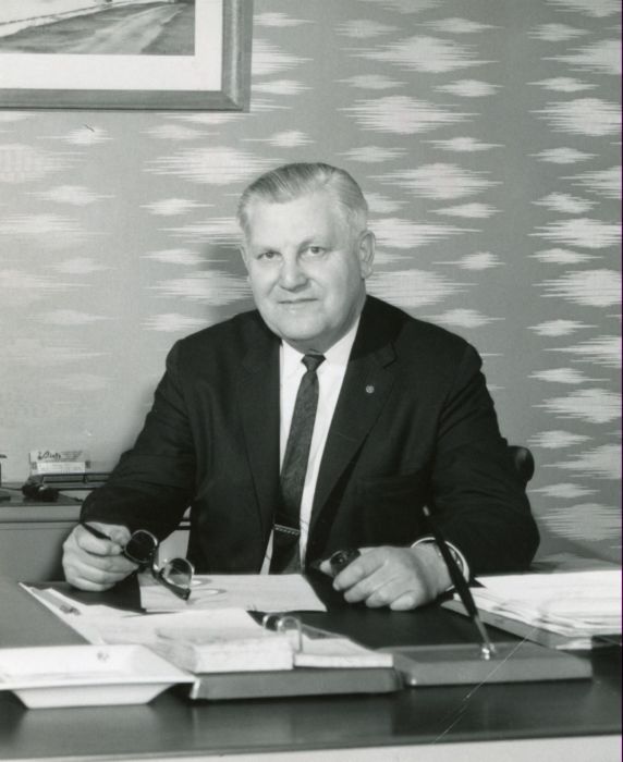 Ernest Notar at his desk