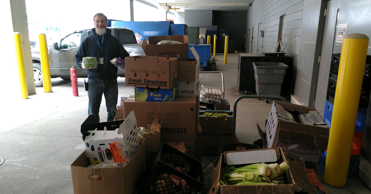 NFCI operations employee Dave Slowik collects food for Community Missions of Niagara Frontier, Inc.
