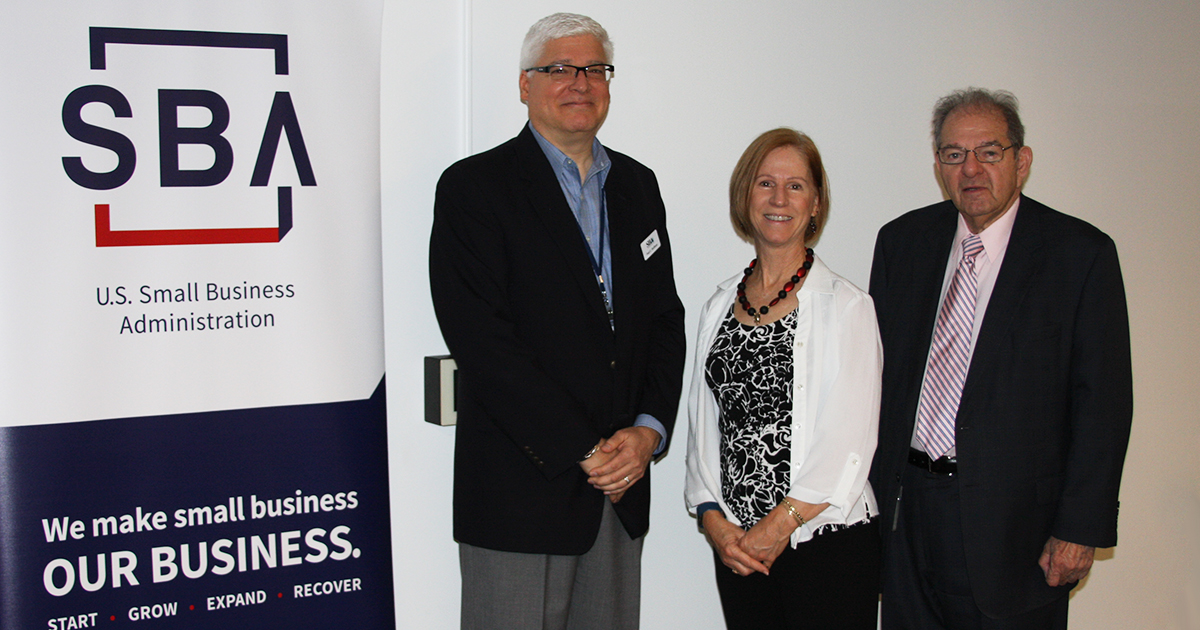 Small Business Association (SBA) representatives with SBDC Director Lynn Oswald (center)