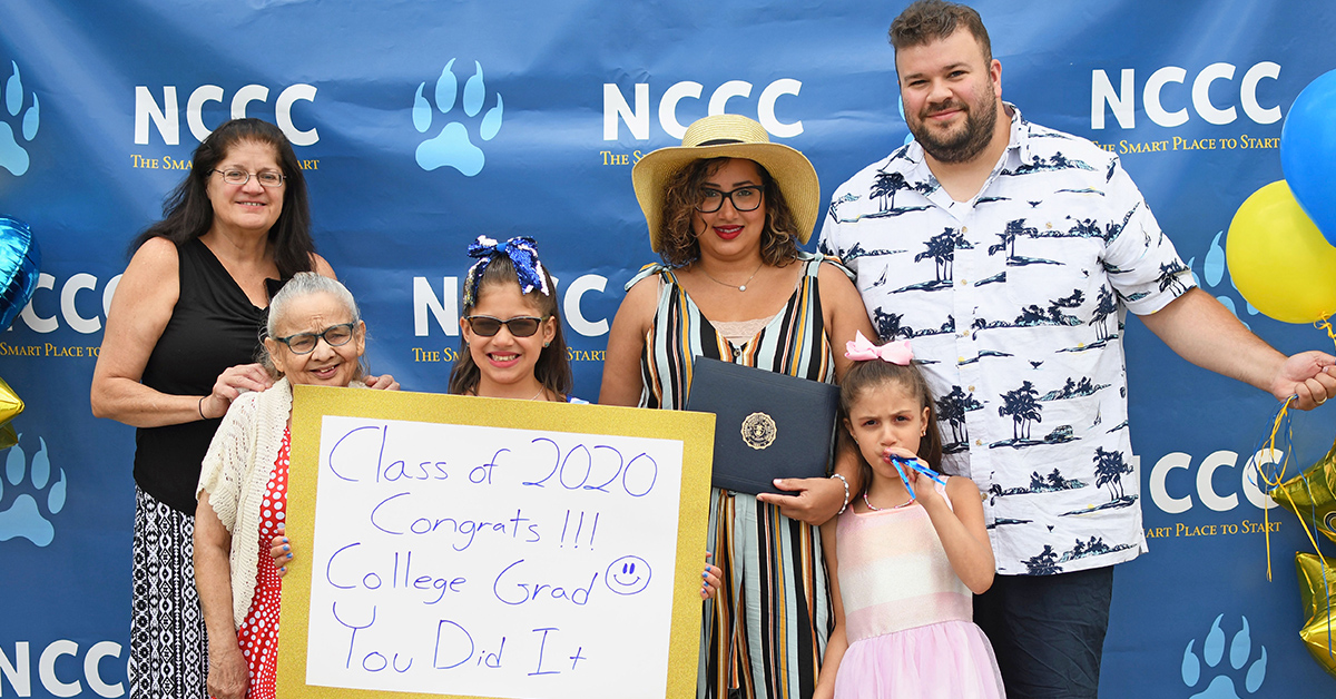 NCCC Graduate, Maritza Rivera poses with her family during diploma pick-up on Thursday, June 25th