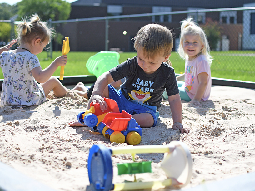 kids playing in sand box