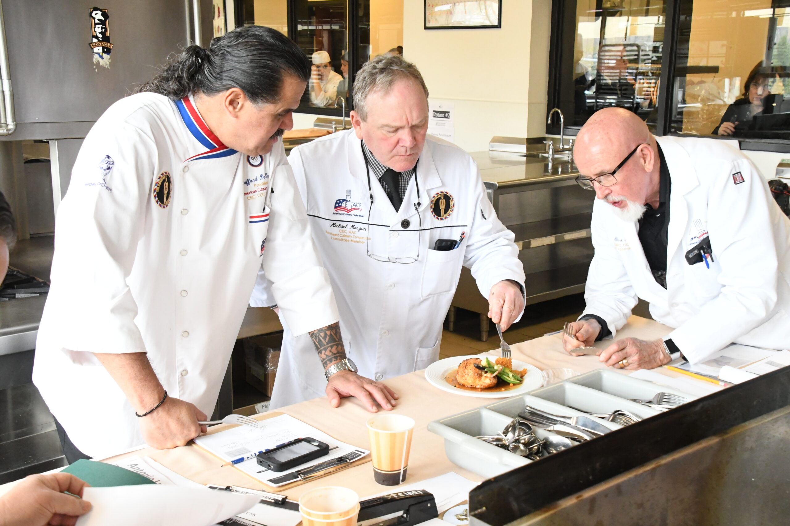 American Culinary Federations Judges examine entry in 2019 culinary competition.