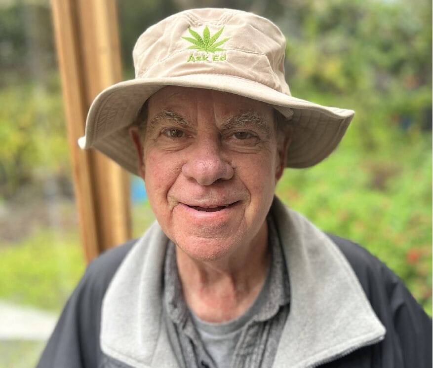 Man with in a marijuana bucket hat.